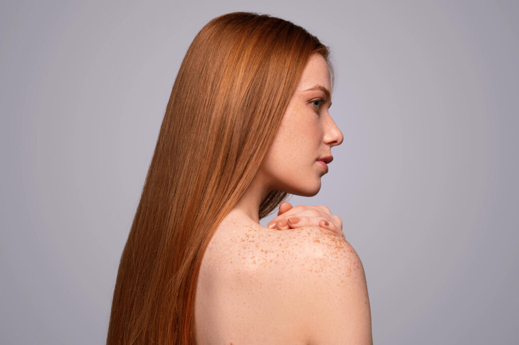 Spray Tanning With Freckles: How to Glow & Keep Your Natural Beauty