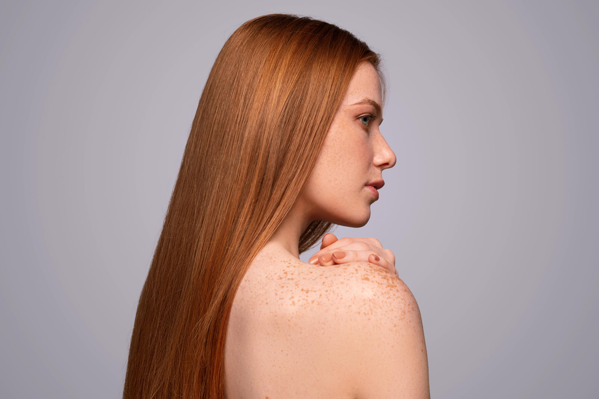 Spray Tanning With Freckles: How to Glow & Keep Your Natural Beauty